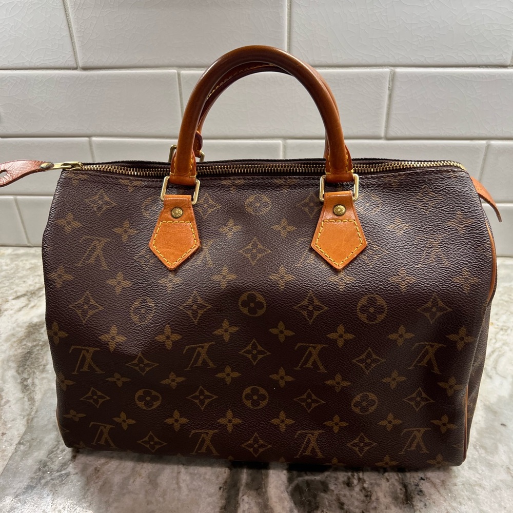 Louis Vuitton Authentic Speedy Handbag.